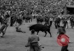 Image of Running of the Bulls Pamplona Spain, 1960, second 48 stock footage video 65675068125