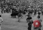 Image of Running of the Bulls Pamplona Spain, 1960, second 49 stock footage video 65675068125