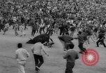 Image of Running of the Bulls Pamplona Spain, 1960, second 50 stock footage video 65675068125