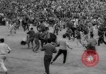Image of Running of the Bulls Pamplona Spain, 1960, second 51 stock footage video 65675068125