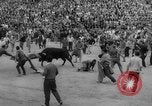 Image of Running of the Bulls Pamplona Spain, 1960, second 52 stock footage video 65675068125