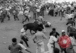 Image of Running of the Bulls Pamplona Spain, 1960, second 55 stock footage video 65675068125