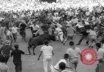Image of Running of the Bulls Pamplona Spain, 1960, second 56 stock footage video 65675068125