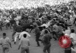 Image of Running of the Bulls Pamplona Spain, 1960, second 57 stock footage video 65675068125