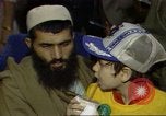 Standbild Menschen in Afghanistan verwundet in der sowjetischen Besetzung Washington DC USA, 1984, aus Sekunde 10 historischem Filmmaterial Videoclip 65675068149