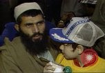 Standbild Menschen in Afghanistan verwundet in der sowjetischen Besetzung Washington DC USA, 1984, aus Sekunde 11 historischem Filmmaterial Videoclip 65675068149