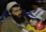 Standbild Menschen in Afghanistan verwundet in der sowjetischen Besetzung Washington DC USA, 1984, aus Sekunde 15 historischem Filmmaterial Videoclip 65675068149