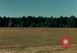 Image of Tuskagee pilot trainees practice taxiing in Piper cub airplanes Alabama United States USA, 1941, second 21 stock footage video 65675068170