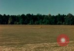 Image of Tuskagee pilot trainees practice taxiing in Piper cub airplanes Alabama United States USA, 1941, second 22 stock footage video 65675068170