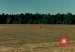 Image of Tuskagee pilot trainees practice taxiing in Piper cub airplanes Alabama United States USA, 1941, second 23 stock footage video 65675068170
