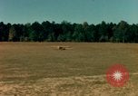 Image of Tuskagee pilot trainees practice taxiing in Piper cub airplanes Alabama United States USA, 1941, second 26 stock footage video 65675068170
