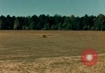 Image of Tuskagee pilot trainees practice taxiing in Piper cub airplanes Alabama United States USA, 1941, second 29 stock footage video 65675068170