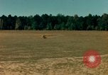 Image of Tuskagee pilot trainees practice taxiing in Piper cub airplanes Alabama United States USA, 1941, second 30 stock footage video 65675068170