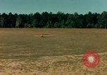 Image of Tuskagee pilot trainees practice taxiing in Piper cub airplanes Alabama United States USA, 1941, second 32 stock footage video 65675068170