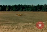 Image of Tuskagee pilot trainees practice taxiing in Piper cub airplanes Alabama United States USA, 1941, second 34 stock footage video 65675068170