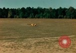 Image of Tuskagee pilot trainees practice taxiing in Piper cub airplanes Alabama United States USA, 1941, second 35 stock footage video 65675068170