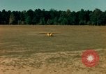 Image of Tuskagee pilot trainees practice taxiing in Piper cub airplanes Alabama United States USA, 1941, second 36 stock footage video 65675068170