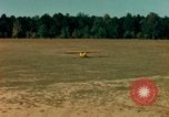 Image of Tuskagee pilot trainees practice taxiing in Piper cub airplanes Alabama United States USA, 1941, second 37 stock footage video 65675068170