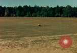 Image of Tuskagee pilot trainees practice taxiing in Piper cub airplanes Alabama United States USA, 1941, second 38 stock footage video 65675068170
