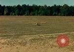 Image of Tuskagee pilot trainees practice taxiing in Piper cub airplanes Alabama United States USA, 1941, second 39 stock footage video 65675068170