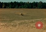 Image of Tuskagee pilot trainees practice taxiing in Piper cub airplanes Alabama United States USA, 1941, second 41 stock footage video 65675068170