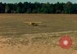 Image of Tuskagee pilot trainees practice taxiing in Piper cub airplanes Alabama United States USA, 1941, second 42 stock footage video 65675068170