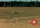 Image of Tuskagee pilot trainees practice taxiing in Piper cub airplanes Alabama United States USA, 1941, second 43 stock footage video 65675068170