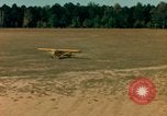 Image of Tuskagee pilot trainees practice taxiing in Piper cub airplanes Alabama United States USA, 1941, second 44 stock footage video 65675068170