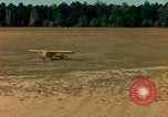 Image of Tuskagee pilot trainees practice taxiing in Piper cub airplanes Alabama United States USA, 1941, second 45 stock footage video 65675068170