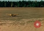 Image of Tuskagee pilot trainees practice taxiing in Piper cub airplanes Alabama United States USA, 1941, second 46 stock footage video 65675068170