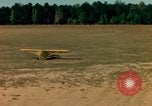 Image of Tuskagee pilot trainees practice taxiing in Piper cub airplanes Alabama United States USA, 1941, second 47 stock footage video 65675068170