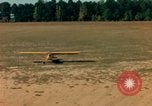 Image of Tuskagee pilot trainees practice taxiing in Piper cub airplanes Alabama United States USA, 1941, second 49 stock footage video 65675068170