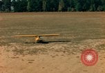Image of Tuskagee pilot trainees practice taxiing in Piper cub airplanes Alabama United States USA, 1941, second 50 stock footage video 65675068170