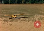 Image of Tuskagee pilot trainees practice taxiing in Piper cub airplanes Alabama United States USA, 1941, second 51 stock footage video 65675068170