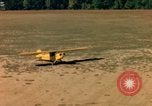 Image of Tuskagee pilot trainees practice taxiing in Piper cub airplanes Alabama United States USA, 1941, second 52 stock footage video 65675068170