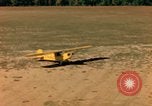 Image of Tuskagee pilot trainees practice taxiing in Piper cub airplanes Alabama United States USA, 1941, second 53 stock footage video 65675068170