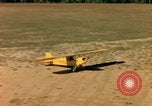 Image of Tuskagee pilot trainees practice taxiing in Piper cub airplanes Alabama United States USA, 1941, second 55 stock footage video 65675068170