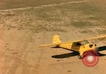 Image of Tuskagee pilot trainees practice taxiing in Piper cub airplanes Alabama United States USA, 1941, second 60 stock footage video 65675068170