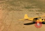 Image of Tuskagee pilot trainees practice taxiing in Piper cub airplanes Alabama United States USA, 1941, second 61 stock footage video 65675068170