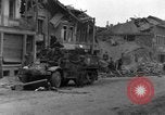 Standbild Bombardierung von Bastogne Belgien, 1944, aus Sekunde 61 historischem Filmmaterial Videoclip 65675068193