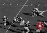 Standbild Fußballspiel Birmingham Alabama USA, 1963, aus Sekunde 21 historischem Filmmaterial Videoclip 65675068210