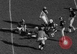 Standbild Fußballspiel Birmingham Alabama USA, 1963, aus Sekunde 26 historischem Filmmaterial Videoclip 65675068210