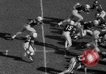 Standbild Fußballspiel Birmingham Alabama USA, 1963, aus Sekunde 28 historischem Filmmaterial Videoclip 65675068210