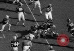 Standbild Fußballspiel Birmingham Alabama USA, 1963, aus Sekunde 31 historischem Filmmaterial Videoclip 65675068210