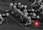 Standbild Fußballspiel Birmingham Alabama USA, 1963, aus Sekunde 59 historischem Filmmaterial Videoclip 65675068210