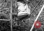 Image of tightrope walking India, 1938, second 54 stock footage video 65675068236