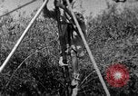 Image of tightrope walking India, 1938, second 15 stock footage video 65675068237