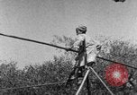 Image of tightrope walking India, 1938, second 25 stock footage video 65675068237