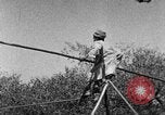 Image of tightrope walking India, 1938, second 26 stock footage video 65675068237