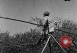 Image of tightrope walking India, 1938, second 28 stock footage video 65675068237